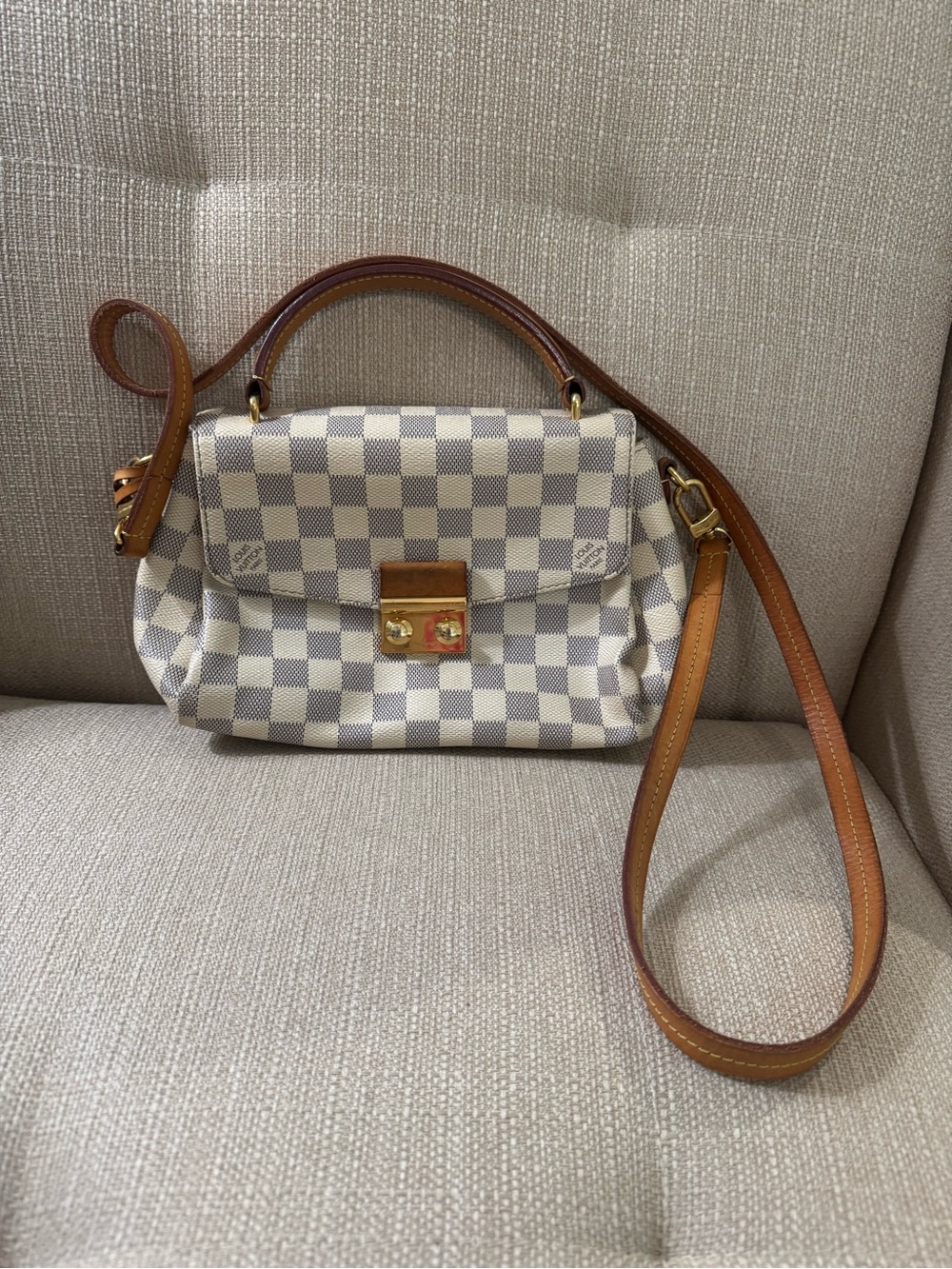 This is an authentic LOUIS VUITTON Damier Azur Croisette.